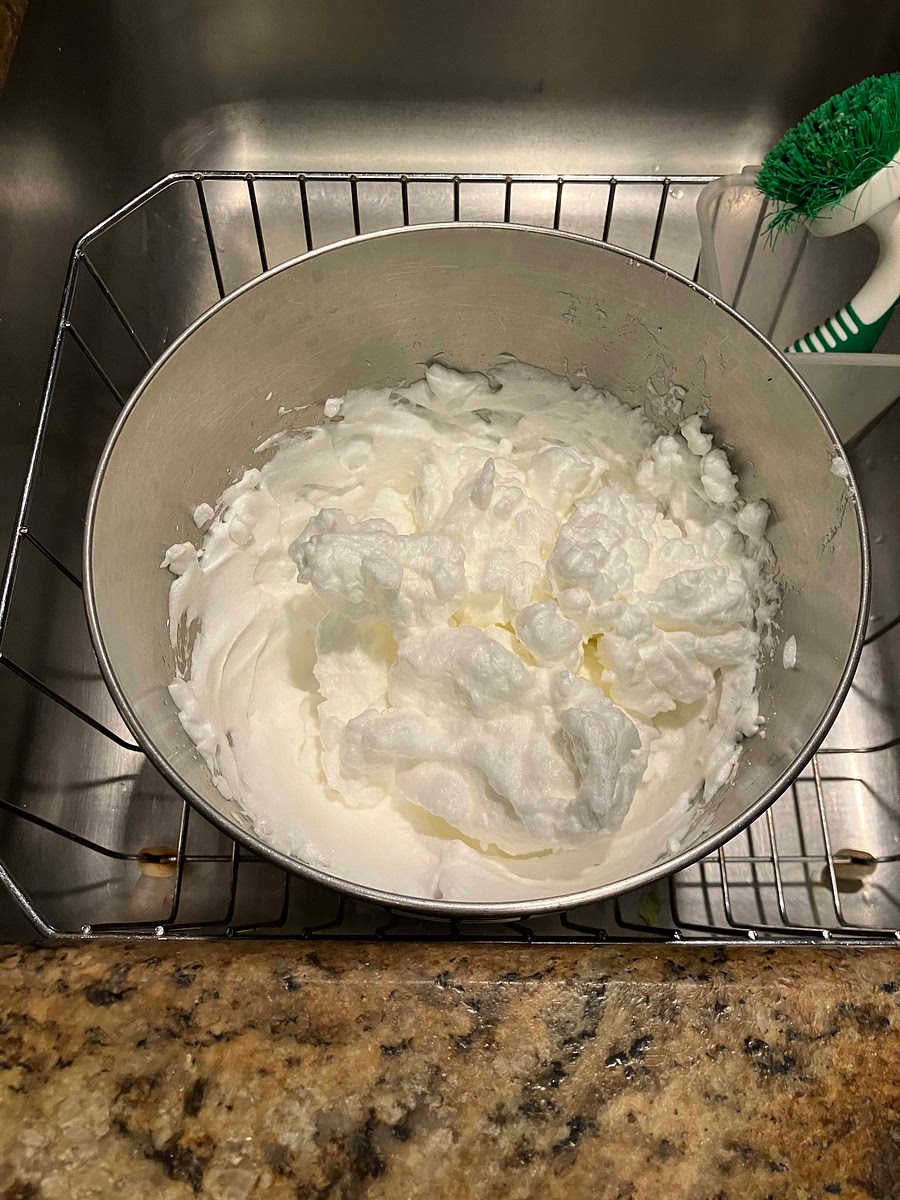 In mixer, beat egg whites on high until peaks form. In a separate bowl, mix egg yolks and buttermilk.