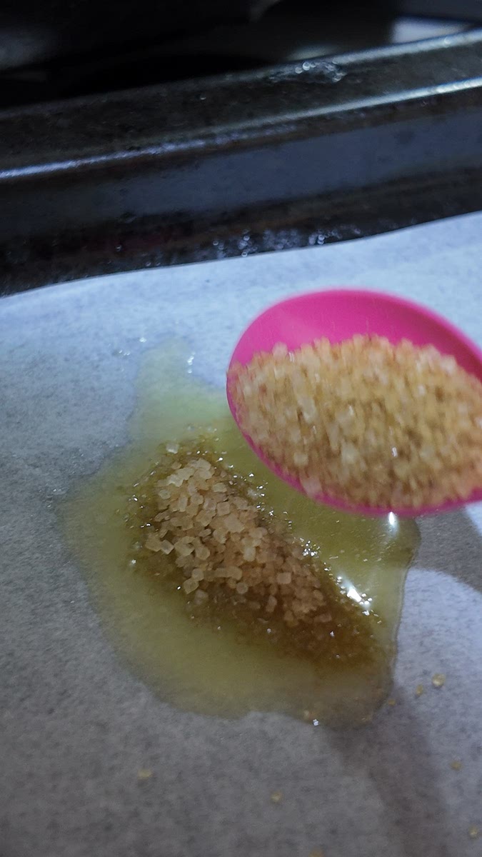 Dust each buttered spot with brown sugar and a pinch of cinnamon.