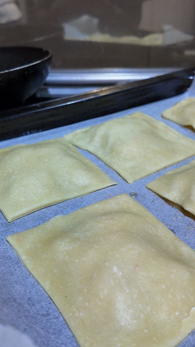 Roll out your homemade puff pastry to about ⅛ inch thick. Cut pieces just big enough to cover the peaches.