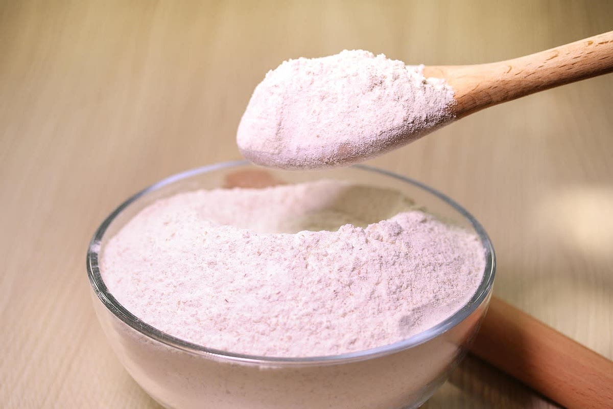Once sizzling, add the flour