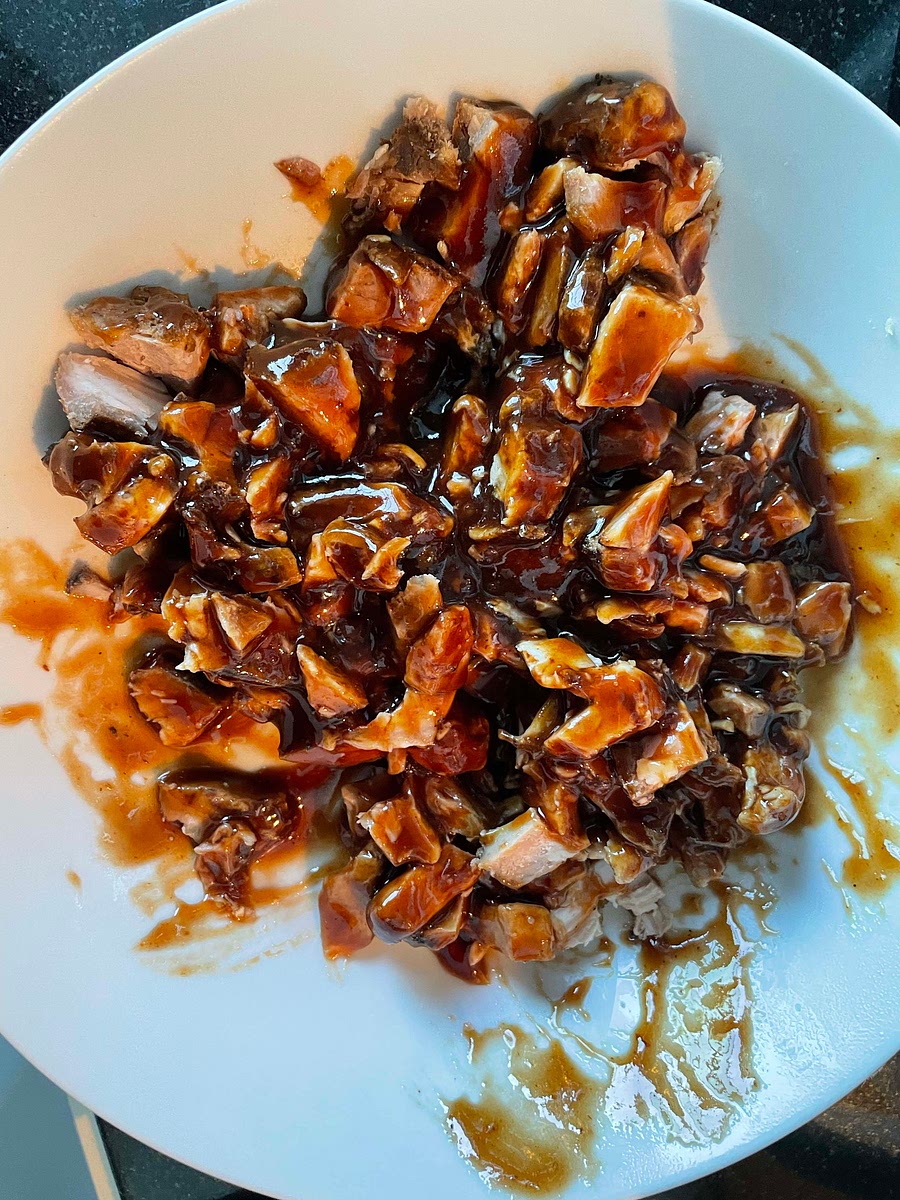 Mix the leftover chicken or pork with the BBQ sauce and save