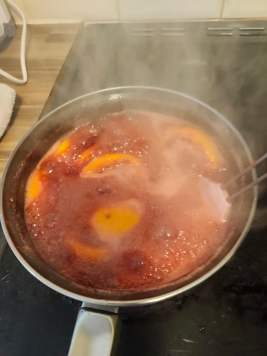 Add all ingredients to a large saucepan (slices or the juices from the lemons and oranges) and set at a high heat. Bring to the boil, and stir for 15 minutes.