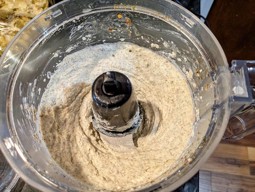 Add all ingredients to a food processor, and blend until smooth