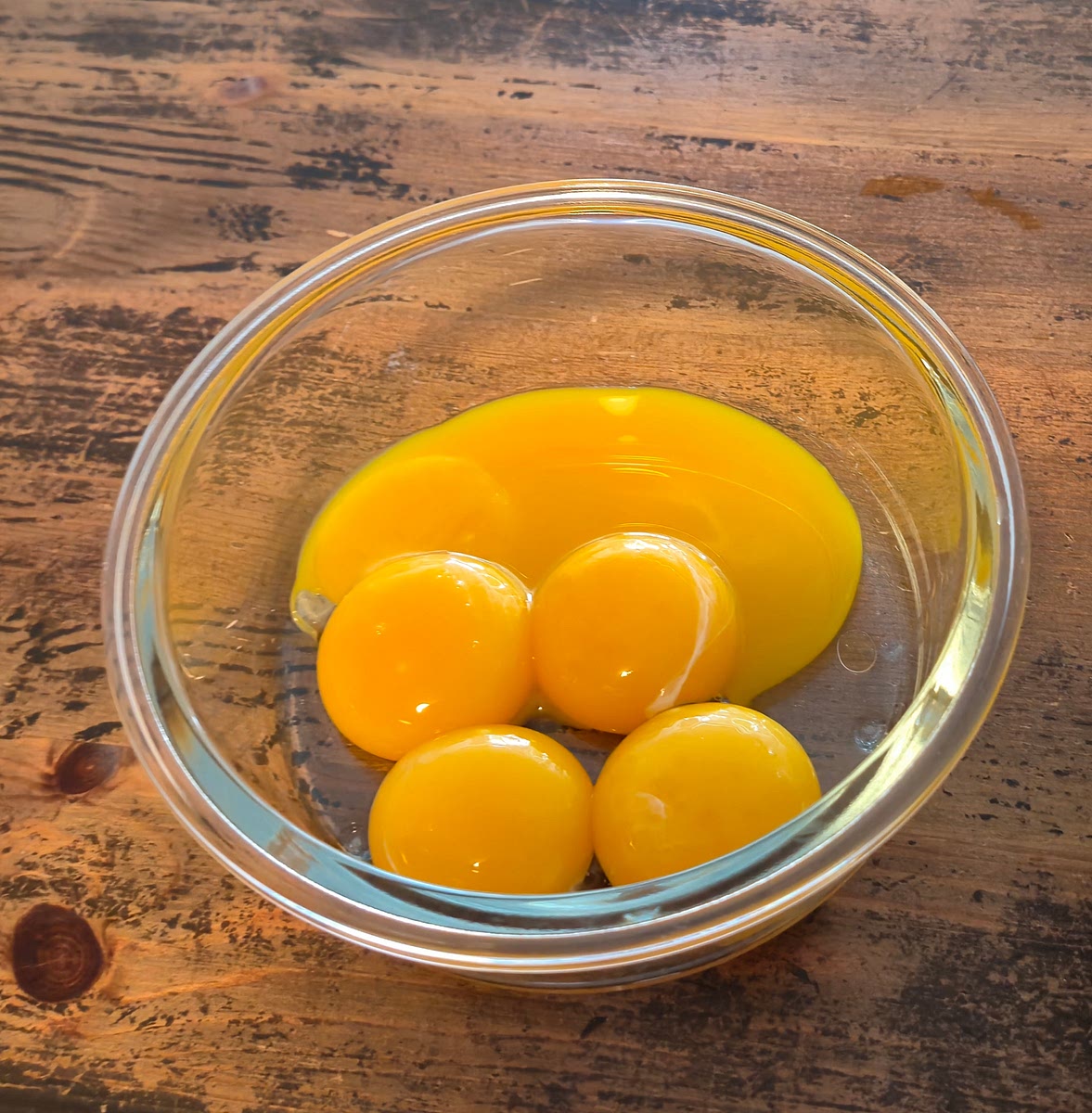 Seperate 5 medium eggs, then add the yolks to a small bowl.