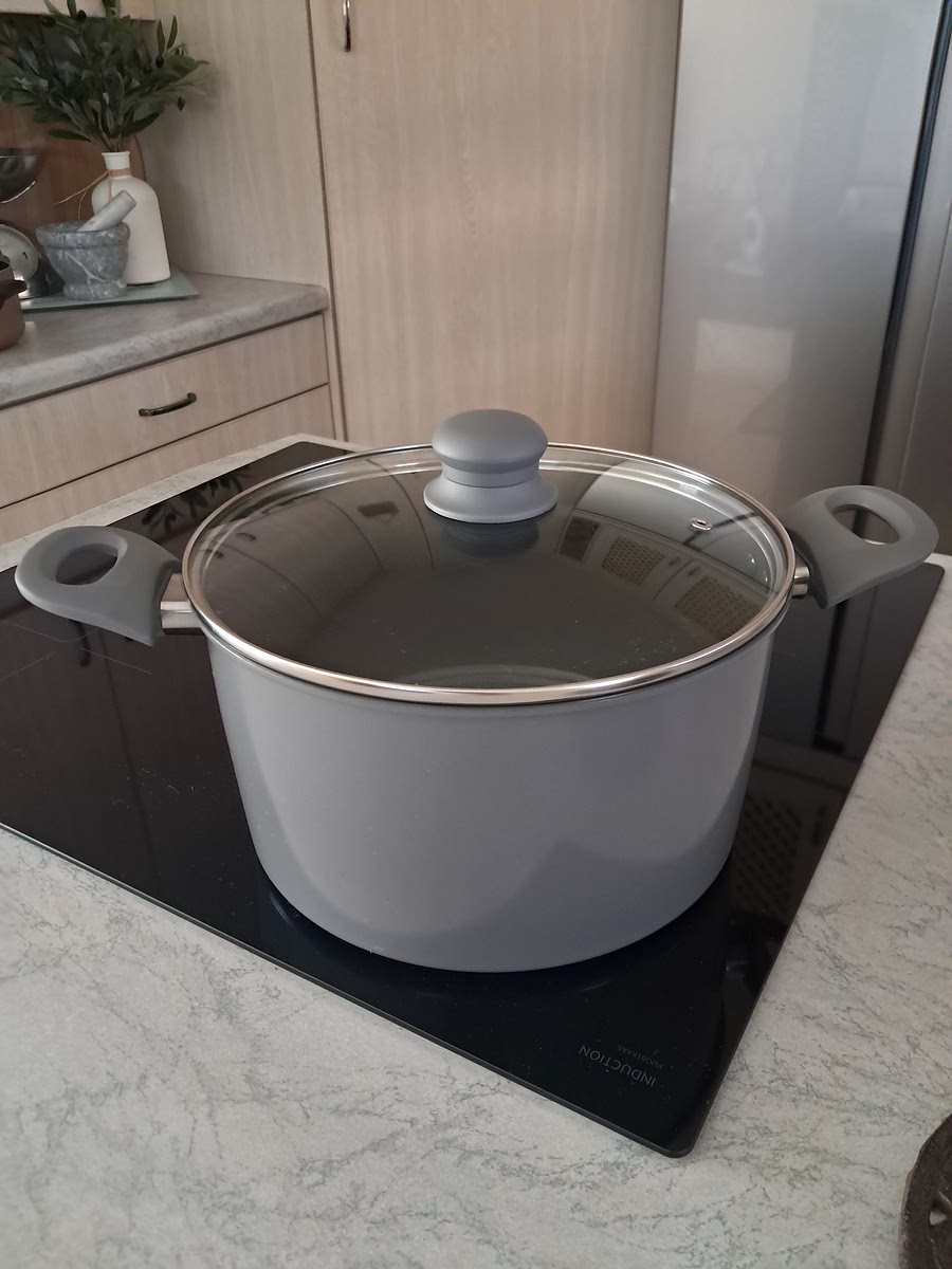 Rinse a non-stick pot with a lid with cold water.