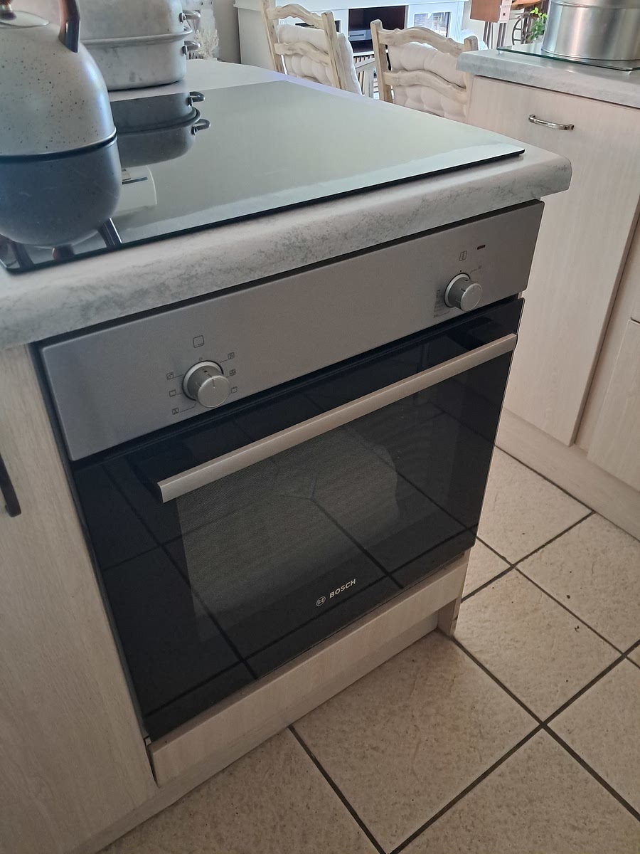 I place my dutch oven with yogurt in my switched off oven for the time so that it is out of my way.