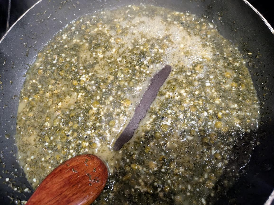 Reduce heat to low. Whisk together the sauce ingredients in a large glass, and add to the pan. Simmer and mix until thickened