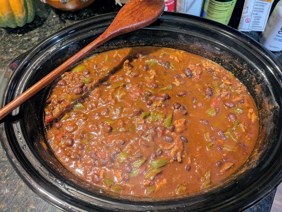 Cover and cook on low for 8 hours. The chili should be done around 10pm. Divide into 6 containers, refrigerate, and go to bed. You earned it