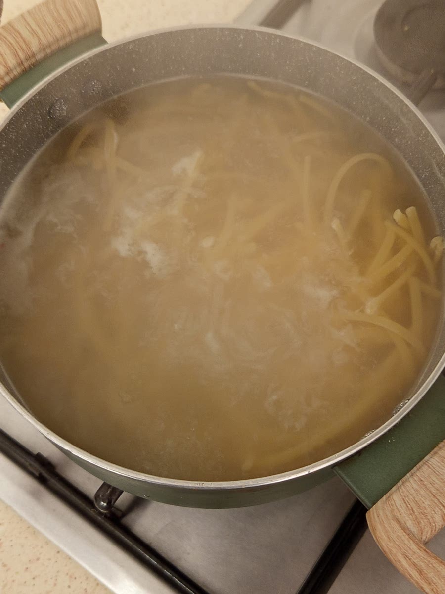 Bring a pot of water to boil, salt it and put in your pasta, stir occasionally and let it cook according to the package instructions