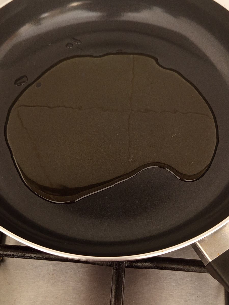 In the meantime, add some oil to a large pan and wait for it to sizzle