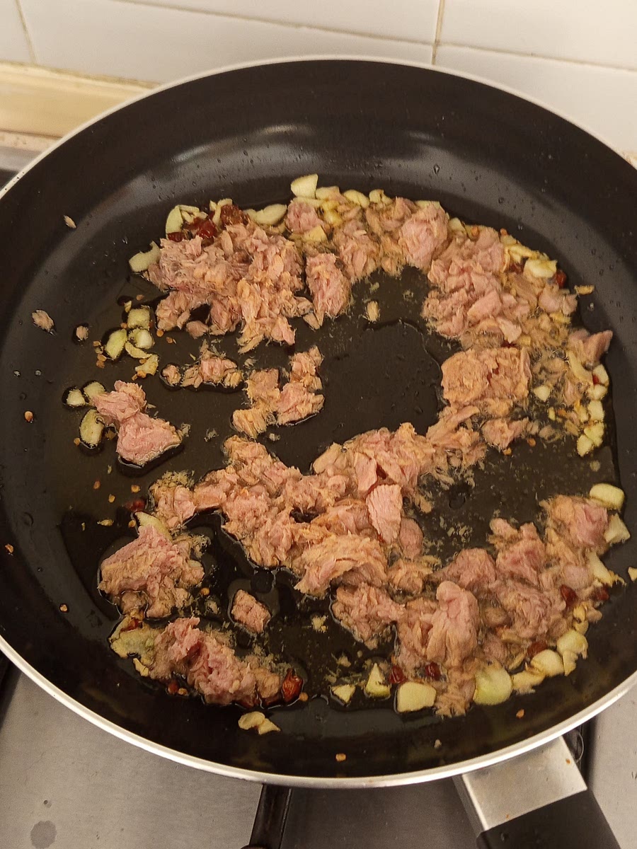 Add the tuna and stir occasionally until cooked and well combined (you can add salt and pepper to taste)