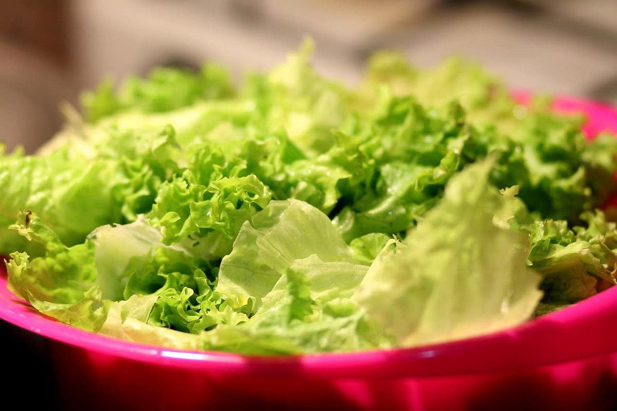 Prepare lettuces, wash, dry and chop as needed