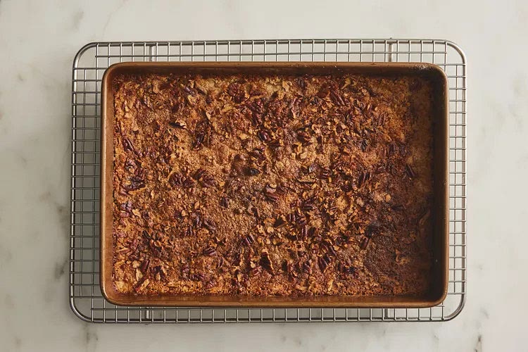 Bake at 350°F for 1 hour to 1 hour and 5 minutes or until golden brown. Remove from oven, and let stand 10 minutes before serving.