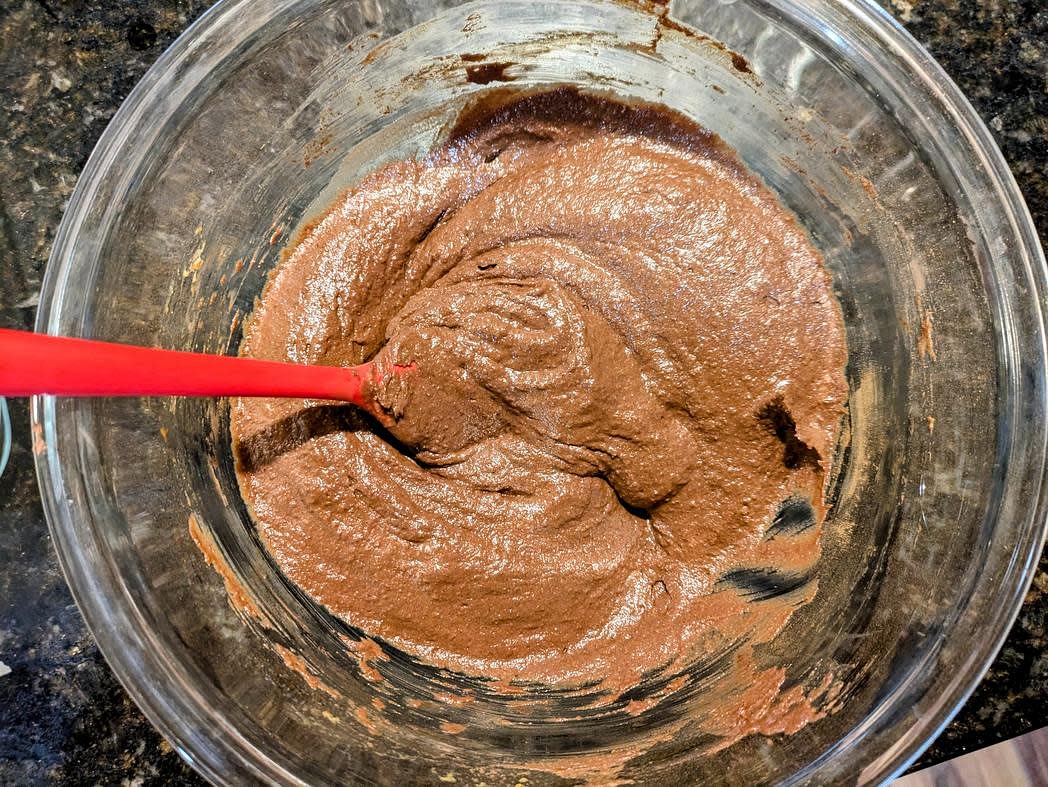 In a large bowl, mix together all brownie ingredients with a silicone spatula until fully combined. Transfer the batter to the pan