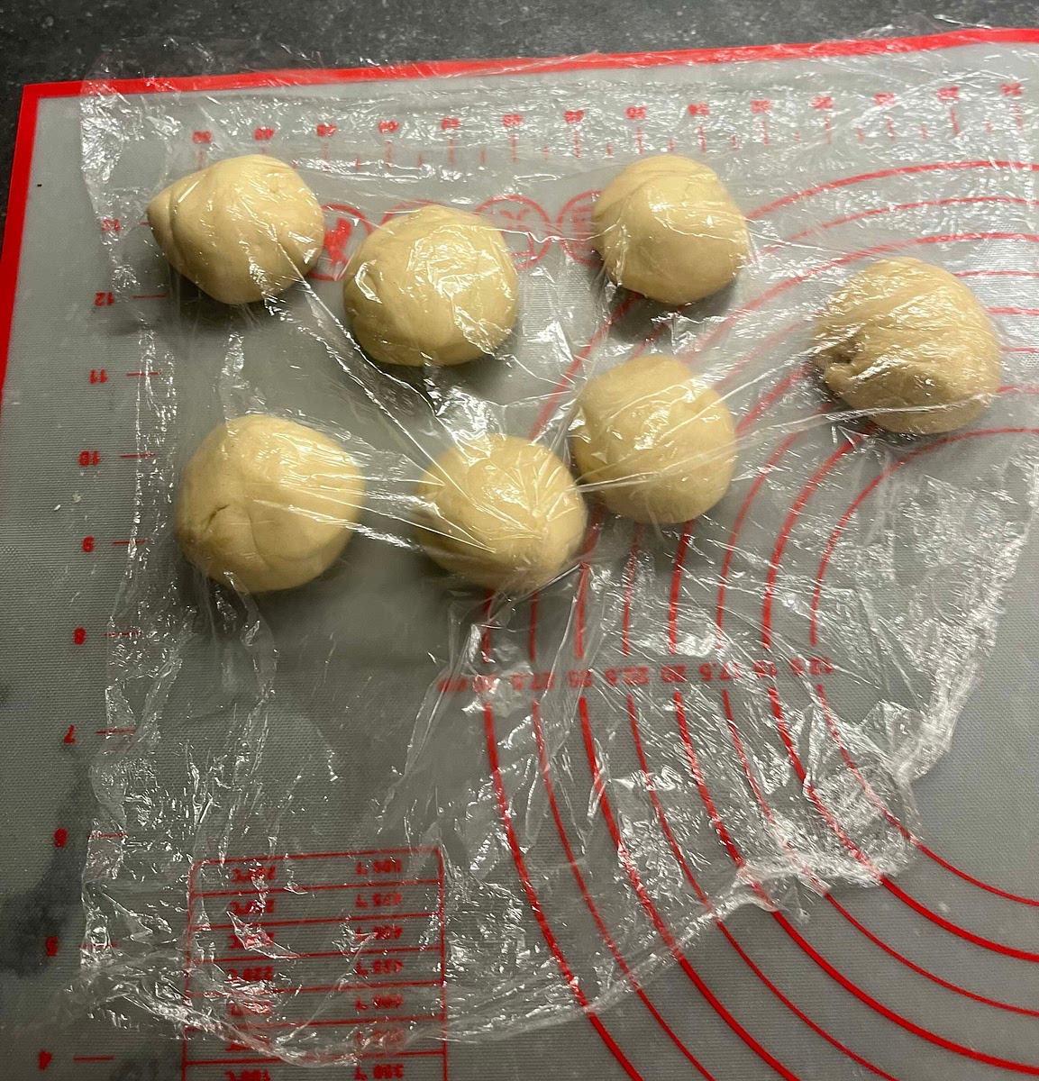 While the bread cooks, flatten and roll the next batch. Keep the raw dough balls covered with cling film while you cook the bread. Repeat the process for all dough balls. Enjoy!