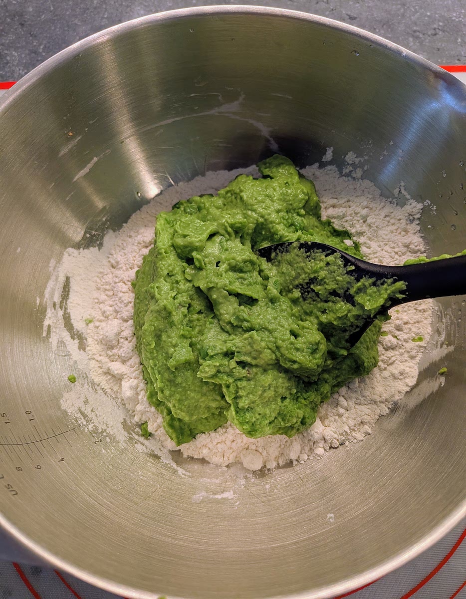 In a large bowl mix the flour, salt, pepper and msg, then add the pea cream and make a dough with a spatula. You may not be able to fully integrate the flour in the bowl, that’s OK.