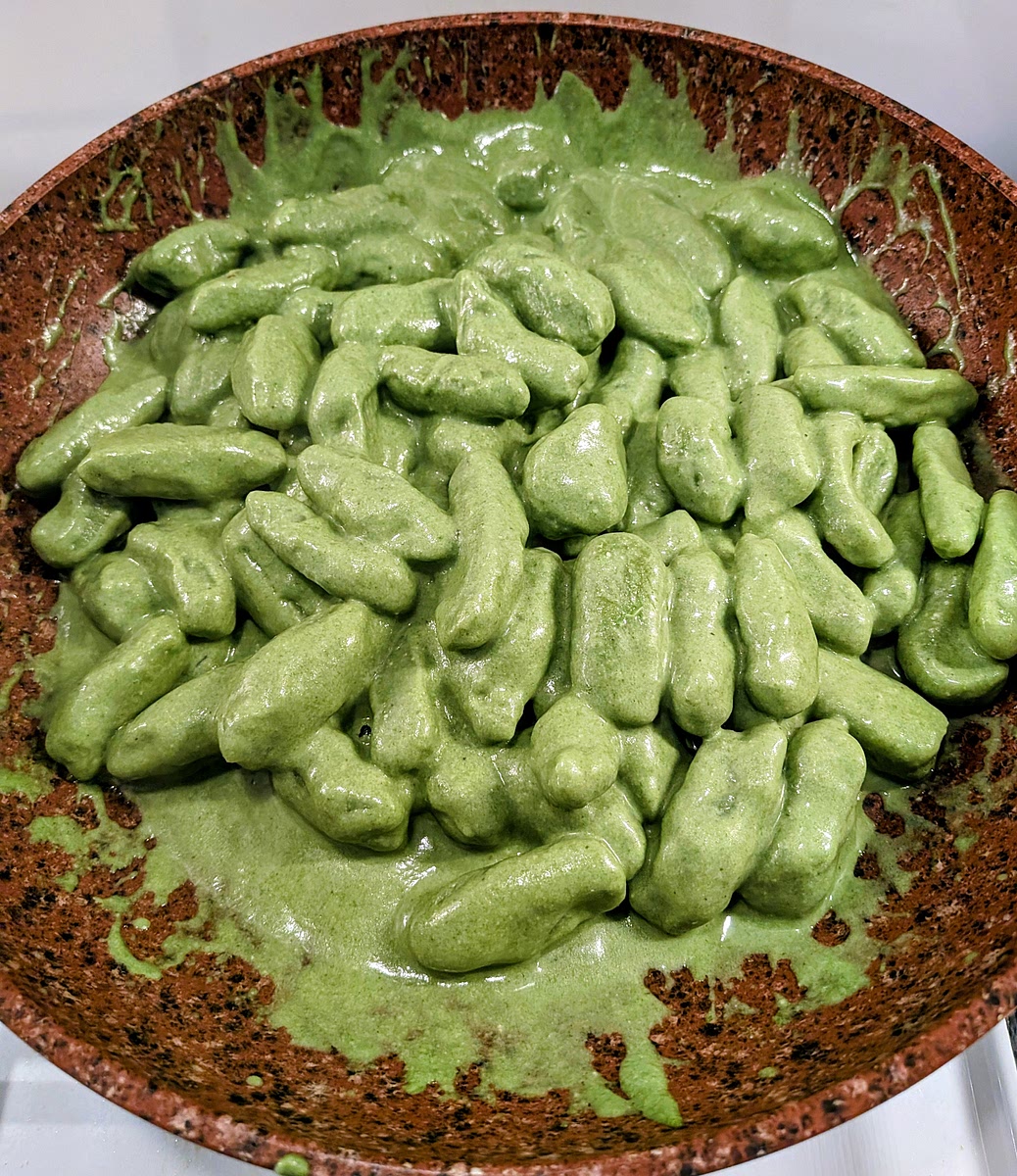 Add the sauce paste and toss the gnocchi in it. The sauce should be creamy… add some cooking water if the sauce is too thick.