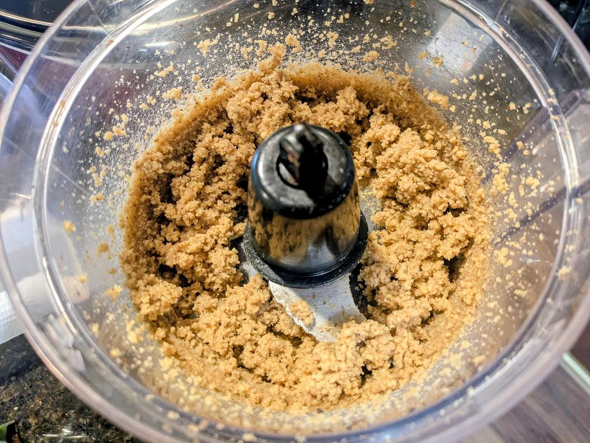 Blend your nuts in a food processor for about 30 seconds, or until you have a coarse crumb
