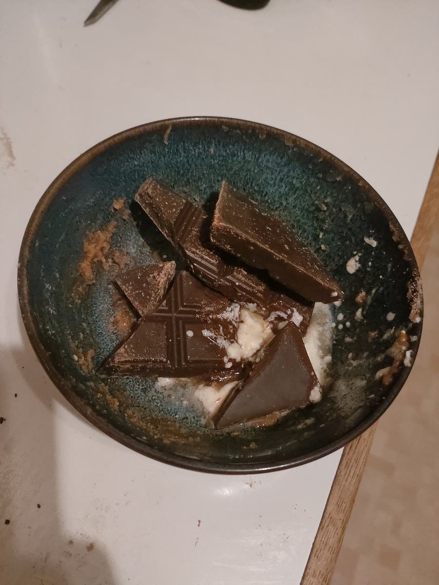 Put together chocolate with rest of the yogurt and melt in the microwave. Mix and keep heating till liquid.