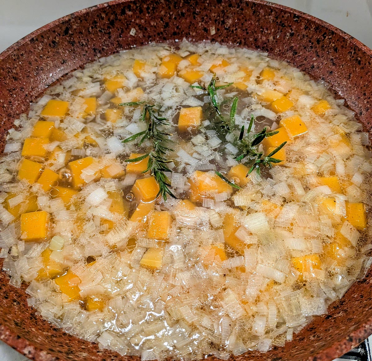 Ladle in boiling water from the pot until veg are covered (1 or 2 full ladles) and simmer until the squash has softened (for 5 to 10 minutes).