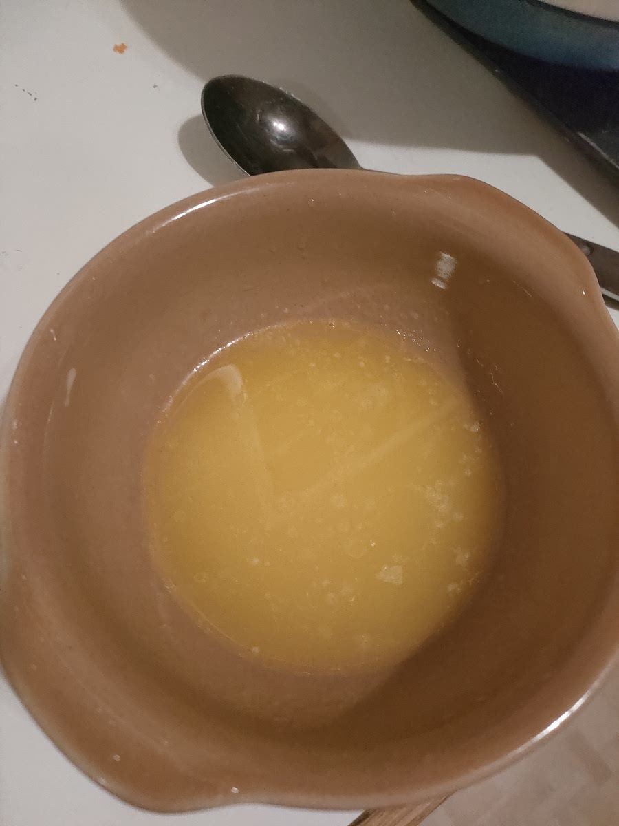 Melt butter and peanut butter in microwave