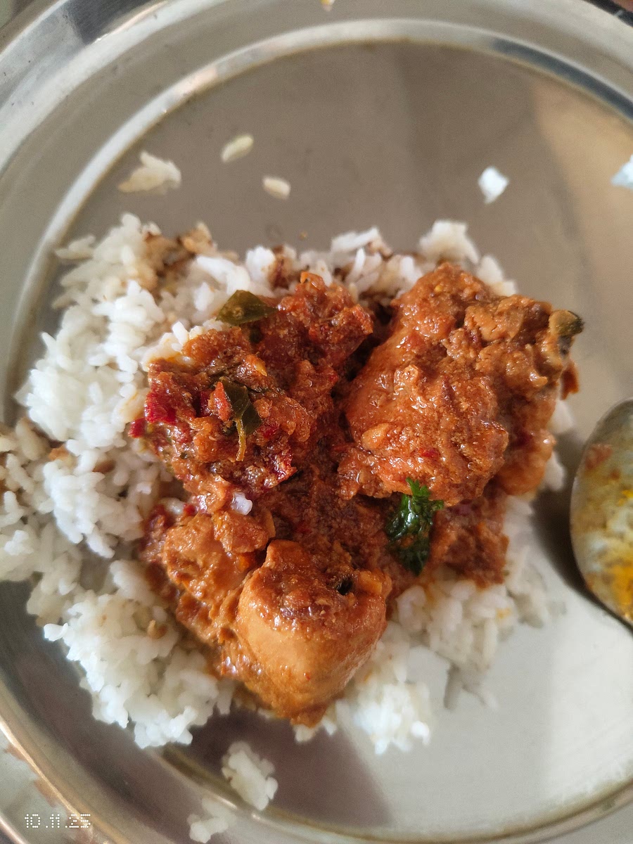 Once the meat starts falling off the bone and the curry is the consistency you want, remove and garnish with coriander. Serve with rice.