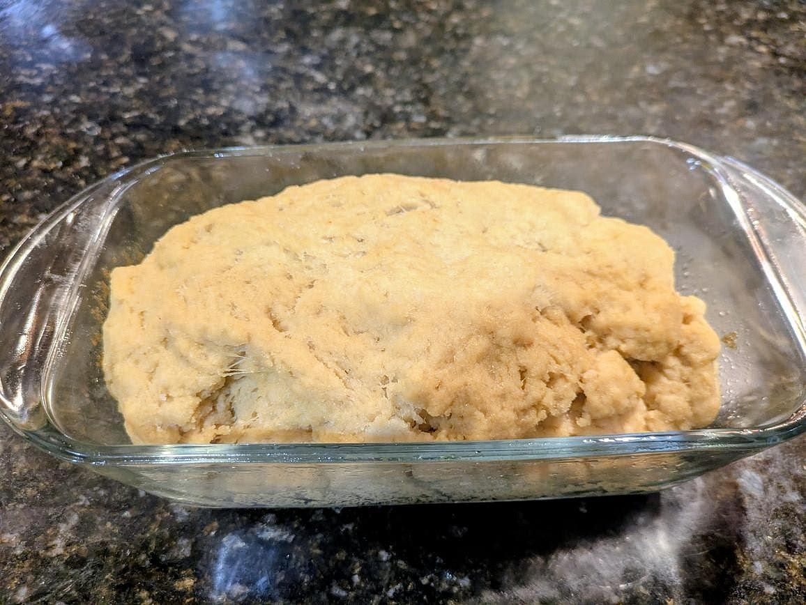 Lightly grease a 9x5" bread pan, and add in your dough. Cover with a clean towel, and let proof at room temperature for 2 hours