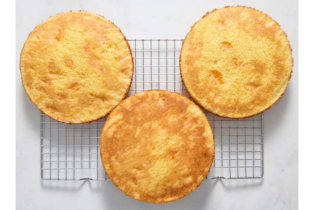 Bake in preheated oven until toothpick comes clean. 25 to 30 minutes, cool layers on cooling rack