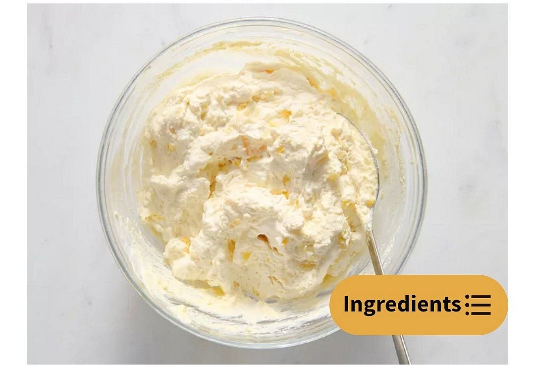 Make the frosting: mix together whipped topping, crushed pineapples, and instant pudding mix.