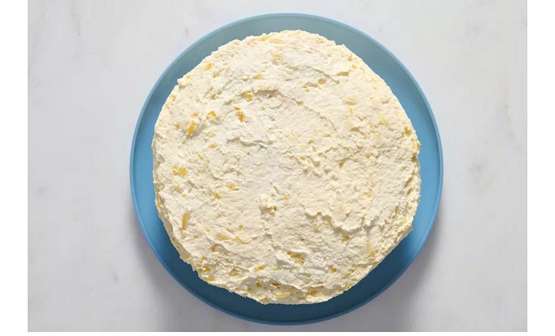 Spread frosting onto cooled cake layers. Stack layers, frost top and sides and refrigerate.