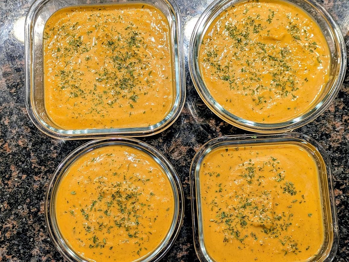 Divide into 4 servings, and garnish with toasted nuts, herbs, or olive oil. Serve