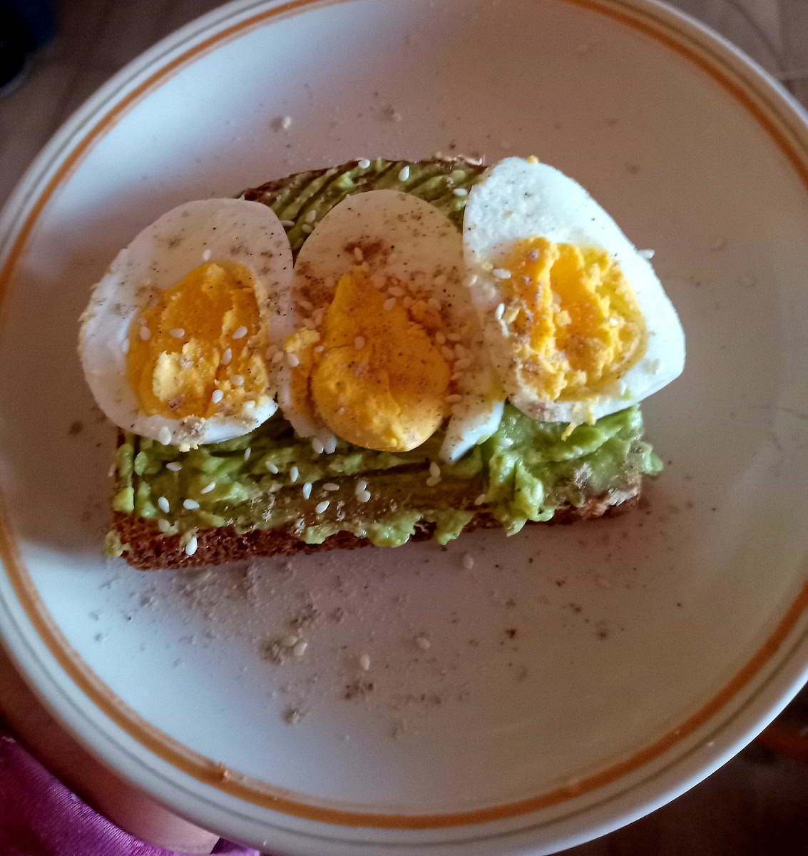 One: get avocado and mash it and put salt and pepper two:get eggs and boiled it three:get whole wheat bread and put avo mash and boiled eggs on top