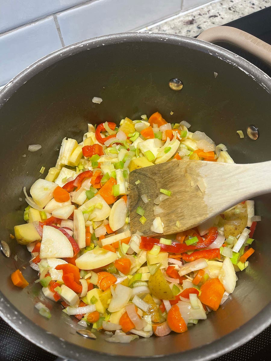 Add some more oil and the rest of your vegetables. Add some more salt as well.