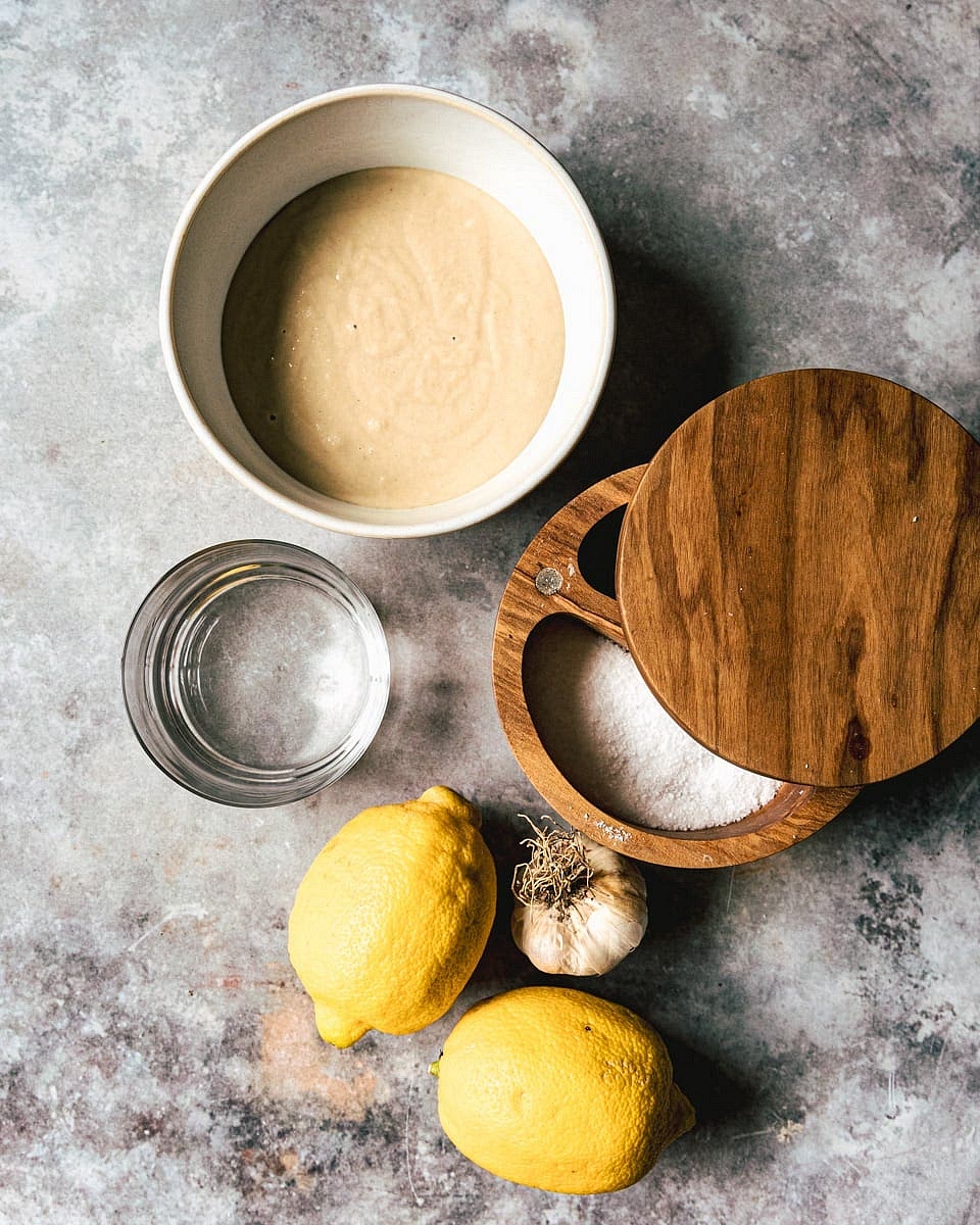 Add all ingredients, except water into a medium size bowl and start combining the ingredients until you get a thick paste