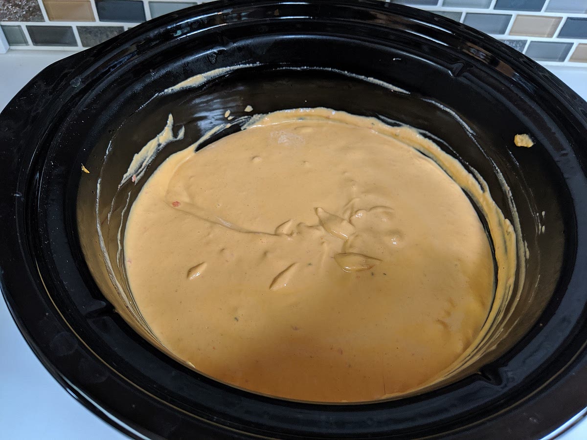 Optionally throw it into a crock pot with a can of salsa or Rotel