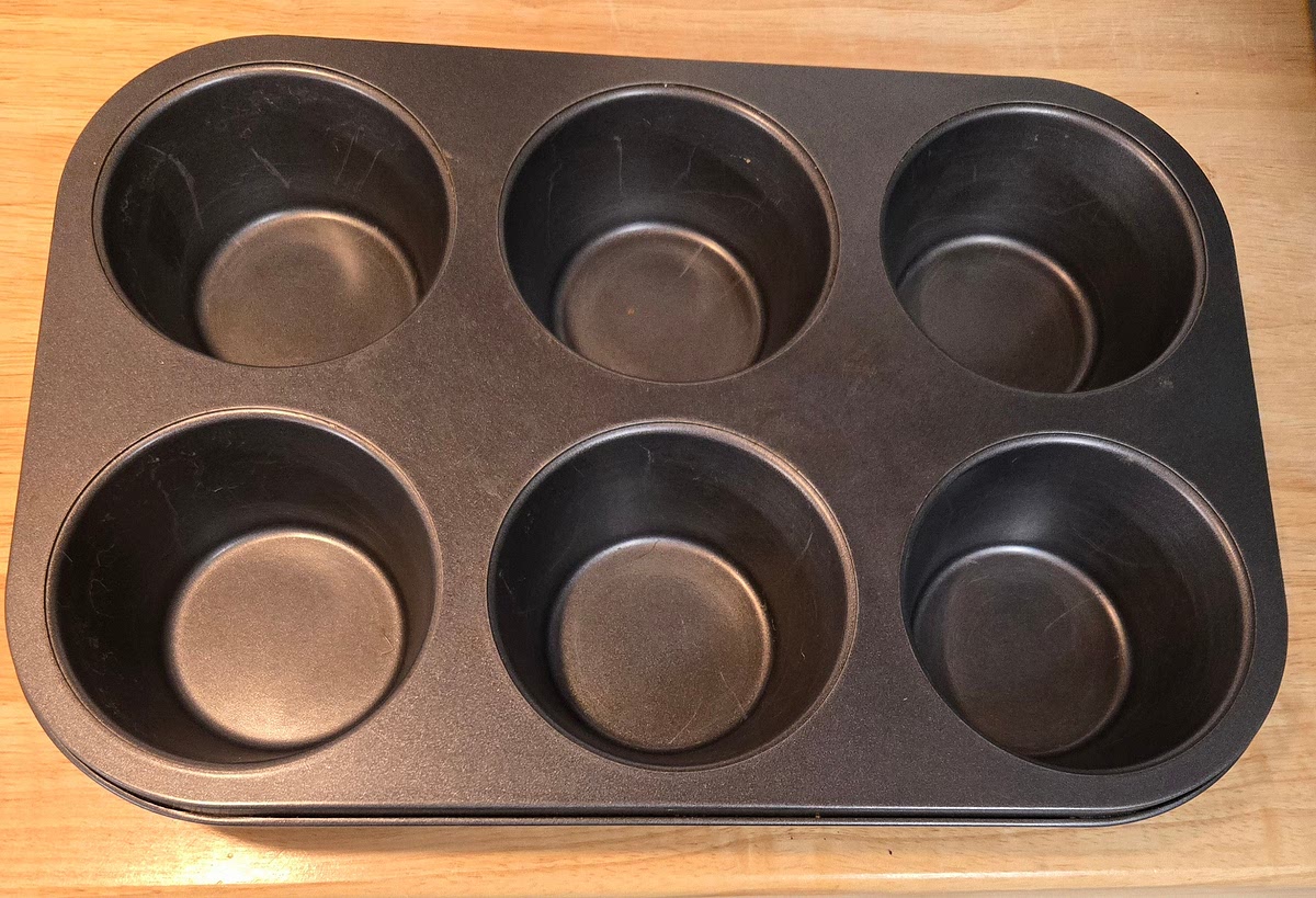 Grease a standard 12-muffin tin.