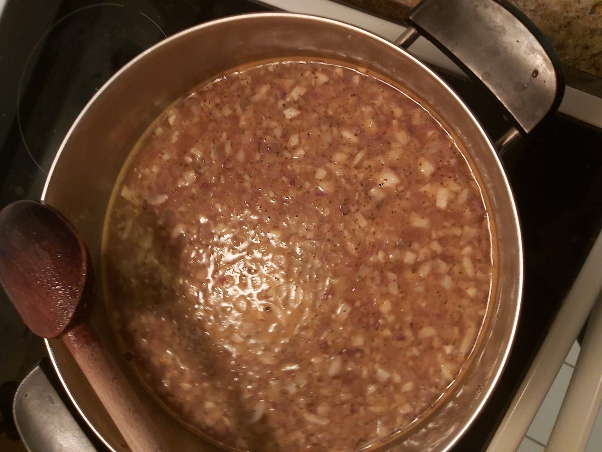 Add broth, tomato sauce and wine (if using) Bring to a boil the reduce to a simmer for 10 minutes