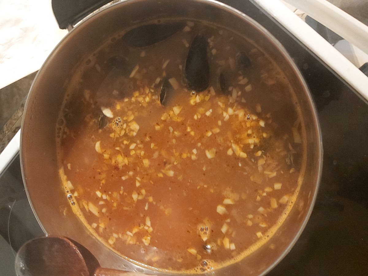 Bring back to a slow boil add the mussles cook for 4 to 8 minutes Enjoy remember to discard any unopen mussles