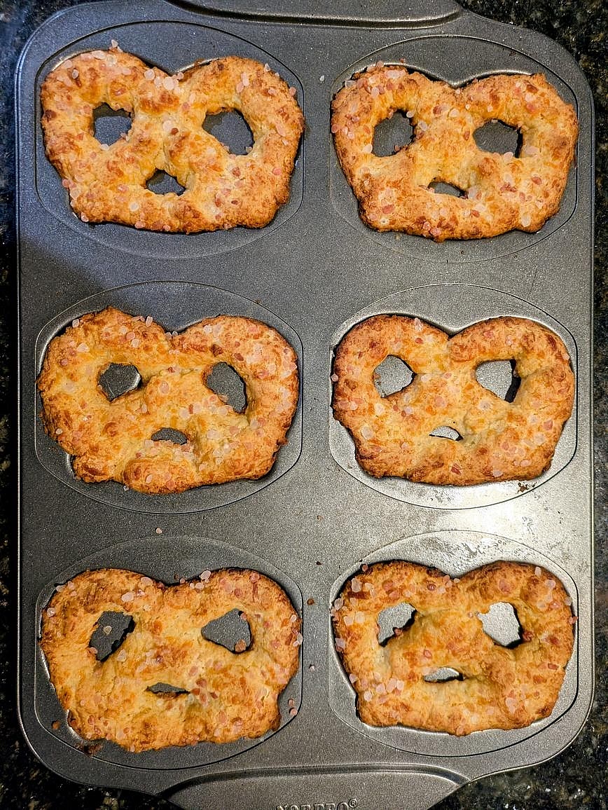 Bake the pretzels at 350F for 18 minutes, or until lightly golden brown. Let cool in the pan for 5 minutes before removing. Serve warm