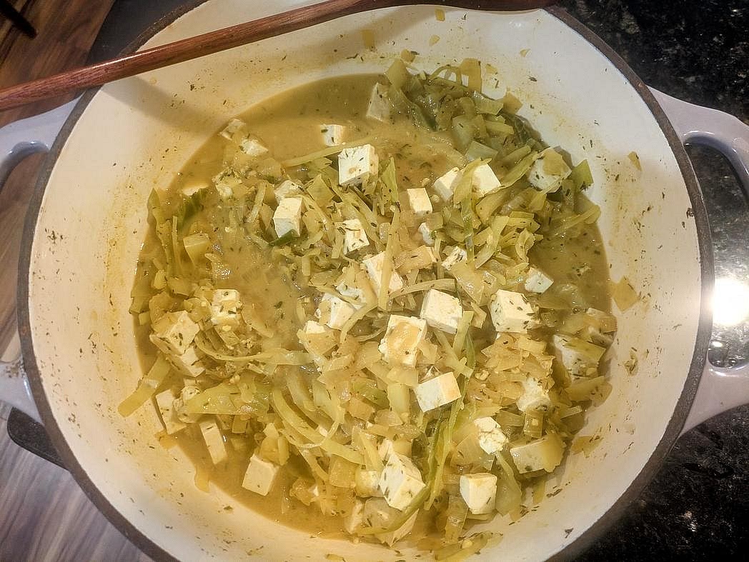 Cut your tofu into bite sized cubes. Add in the tofu, and gently stir to combine. Serve