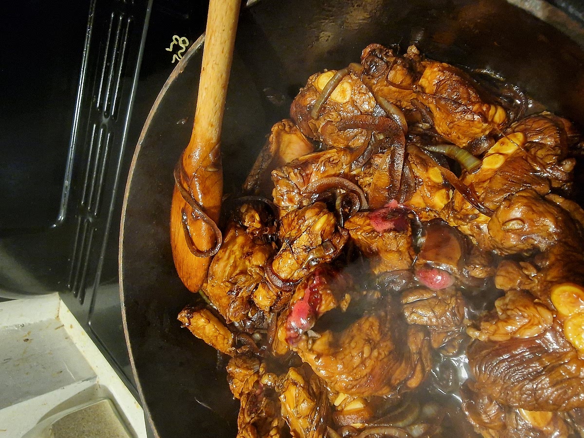 Add the ribs, stirring often until sealed on all sides. Add dark soy sauce and stir to coat. Continue to fry until most of the cut ends of the bones are oozing bone marrow.