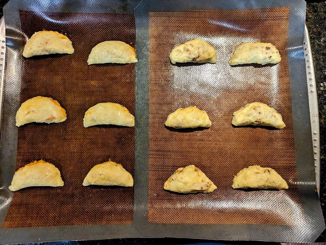 Carefully fold the dough over to make semicircles, and seal the dough shut with your hands. Repeat for all pieces of dough