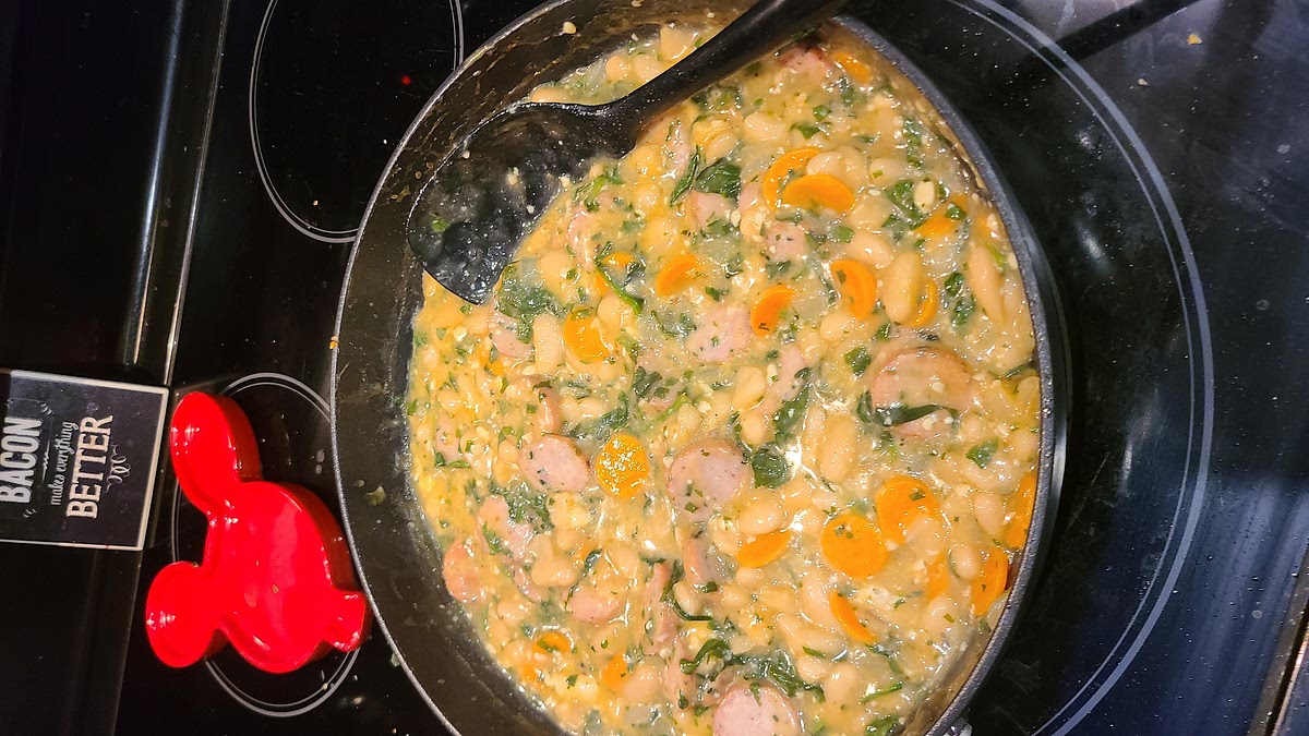 Add sausage back into skillet, and add spinch to wilt. Remove from heat and let stand 5 min