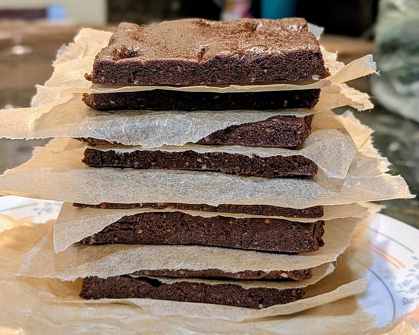 Cut into 9 protein bars. Store leftovers in an airtight container with a piece of parchment paper between each one to prevent sticking