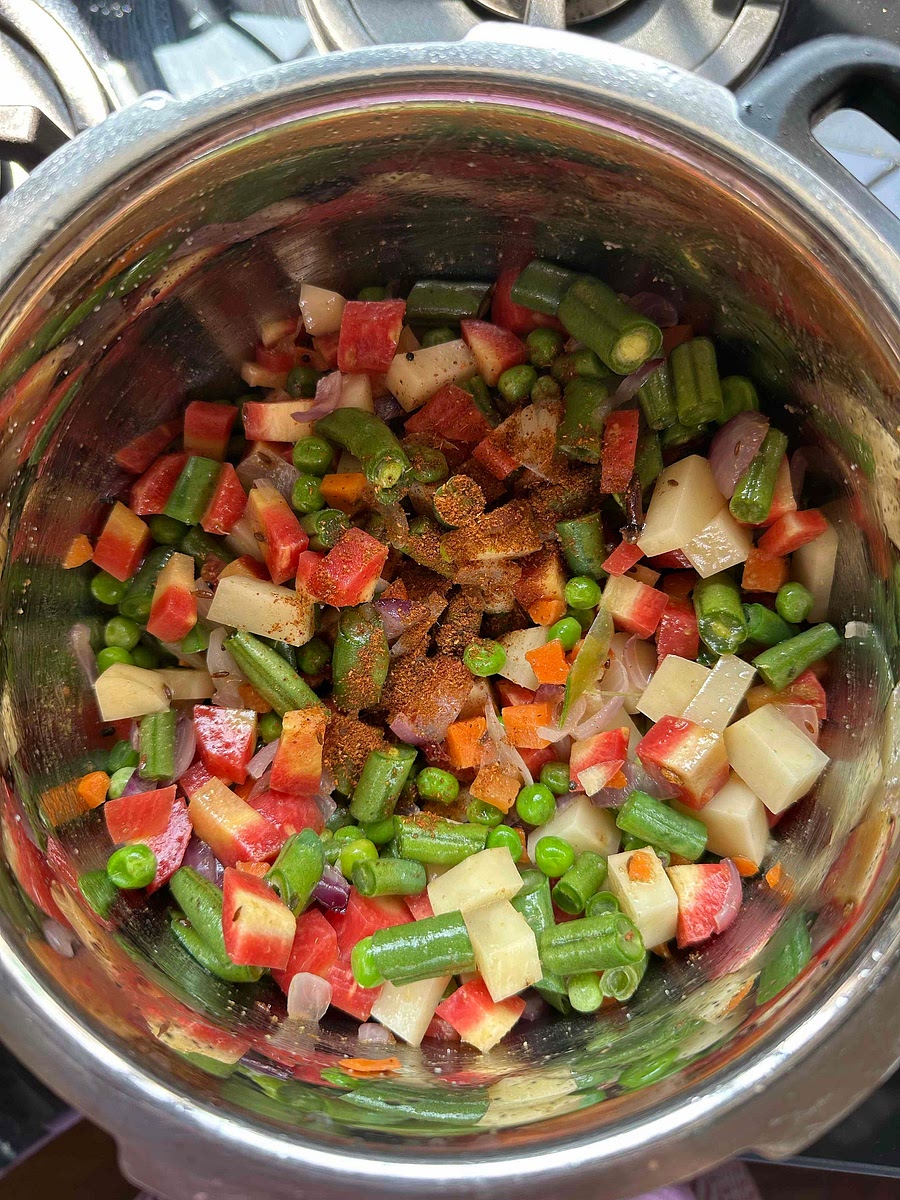 Add salt, jeera powder, dhaniya powder, and garam masala