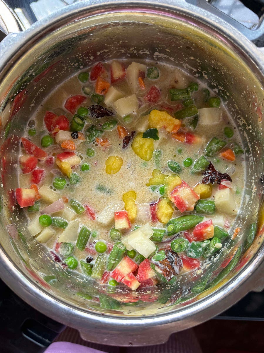 Add ghee. Keep a lid on the pot till the vegetables cook fully.