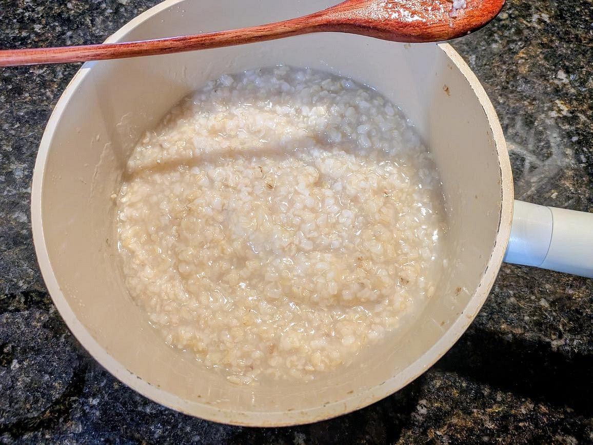 Reduce heat to medium low, and let simmer (covered) with occasional stirring for about 60-90 minutes, or until thick and creamy