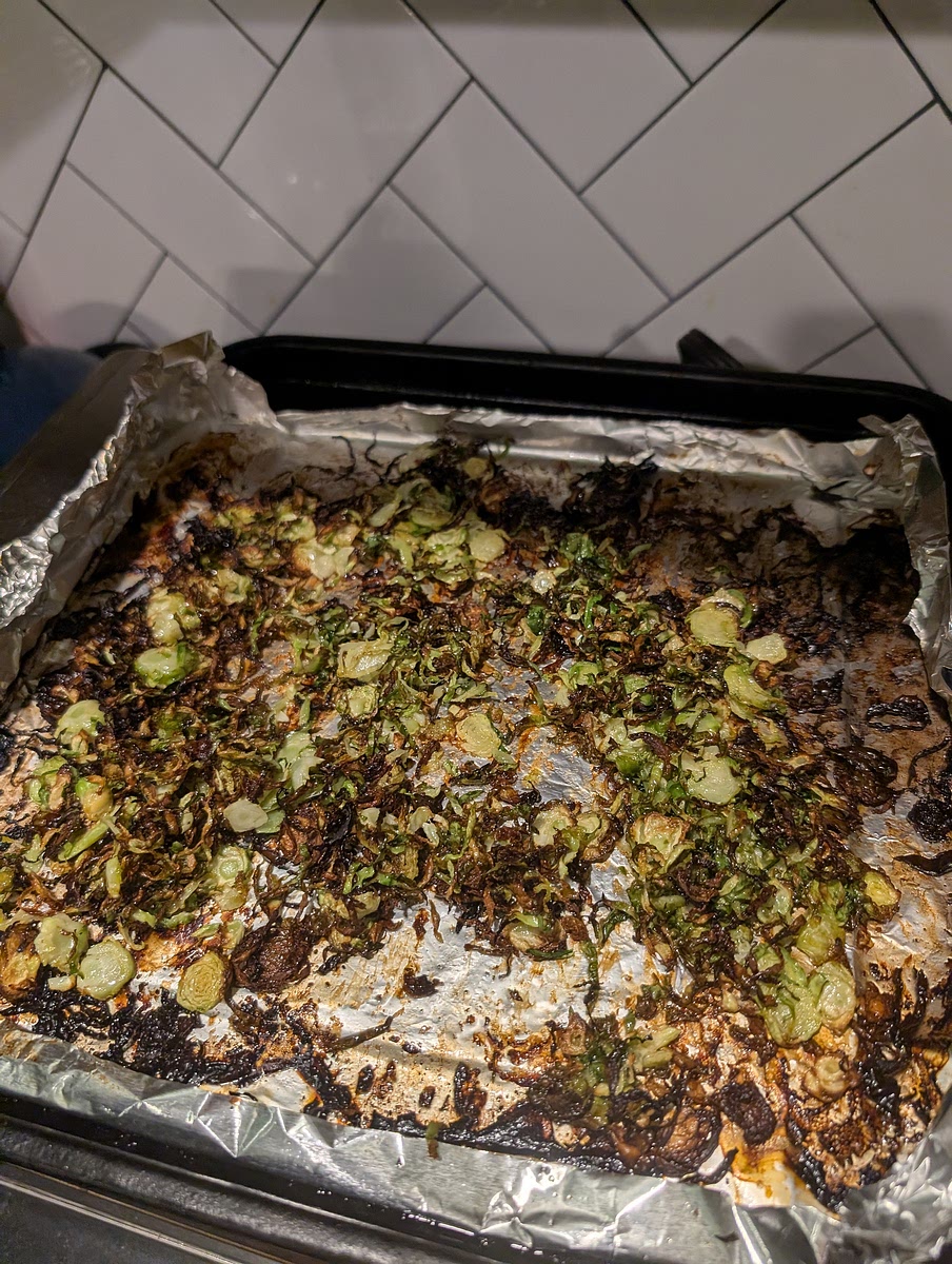 Add the shaved brussel sprouts to the baking sheet and air fry at 450 for 10 min. Stirring halfway through. Be sure to leave space so they char rather than steam. Depending on size of your pan you may need to do this in batches.