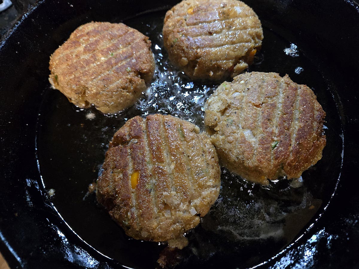 Heat oil in a 10-inch cast iron or dutch oven skillet over medium-high heat. Fry croquettes in batches for 3 to 4 minutes per side until golden brown. Transfer to a paper towel-lined plate. Save the oil.