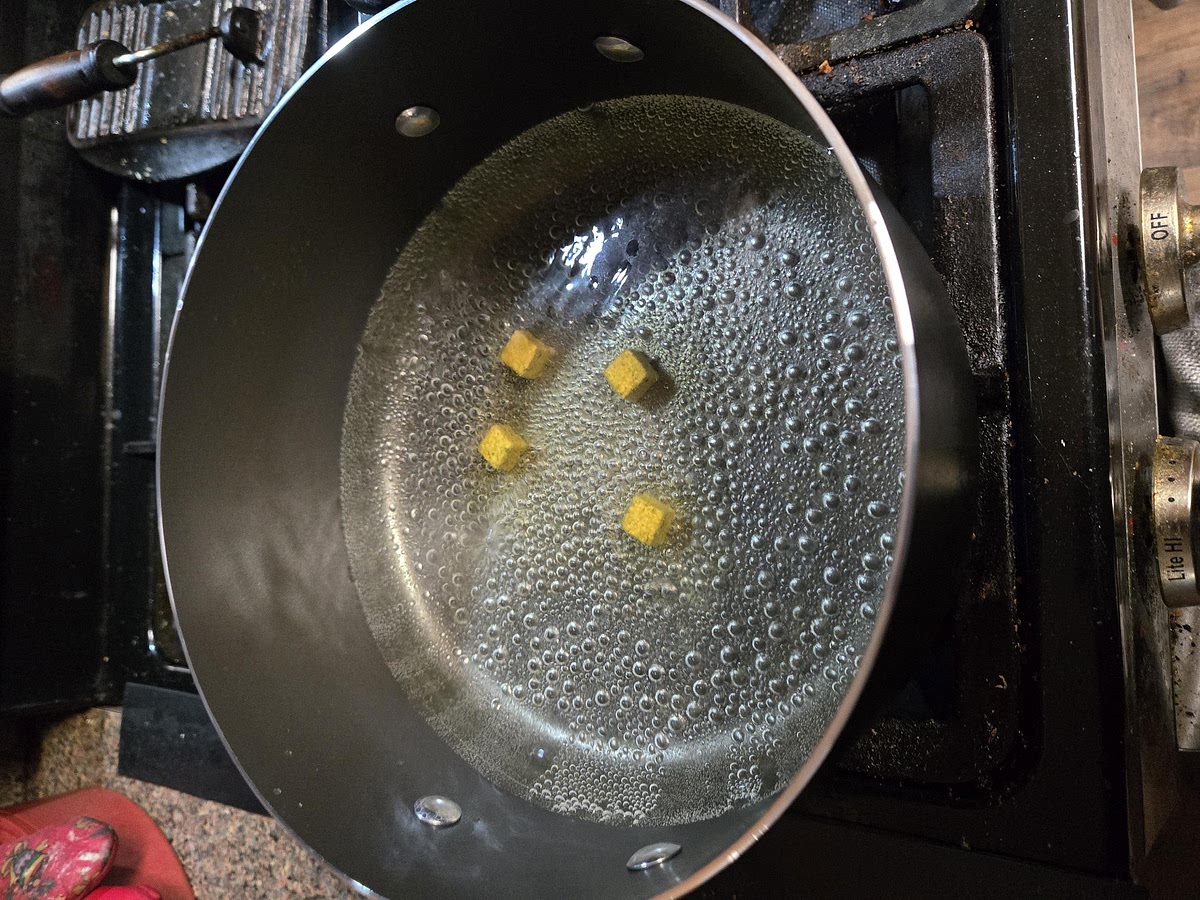 Cut the potato into fry-sized strips. Choose one method: Soak or Par boil.